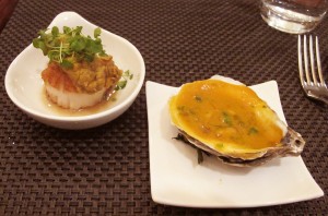 Seared scallop topped w/ a fried oyster & red curry sauce