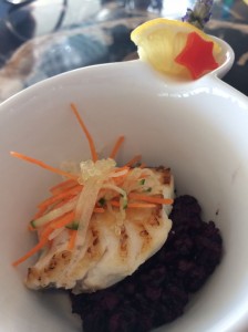 Seared Rockhind with black rice, crisp vegetables, finger limes